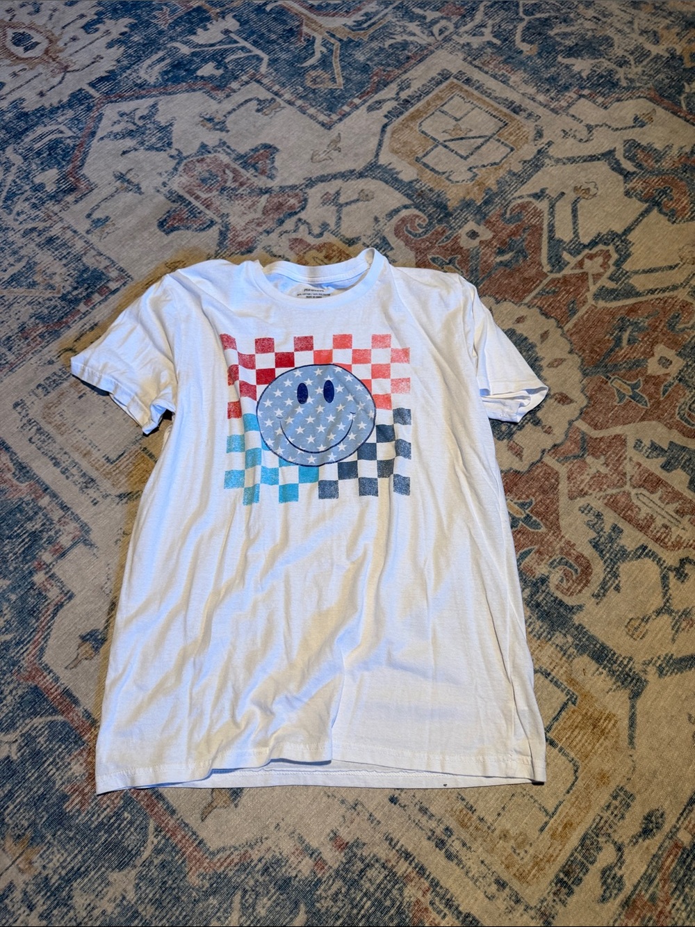 White Graphic Tee with Stars & Checkerboard Smiley
